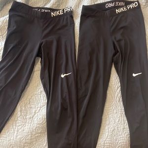 Two pairs full length Nike pro leggings